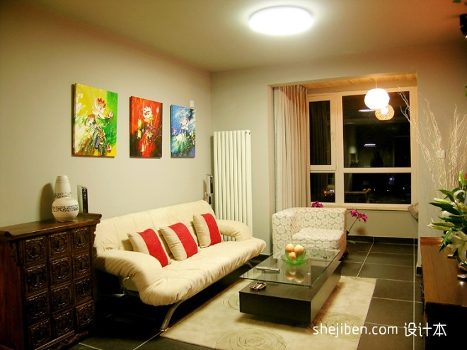 小平米客厅沙发挂画背景墙装修效果图